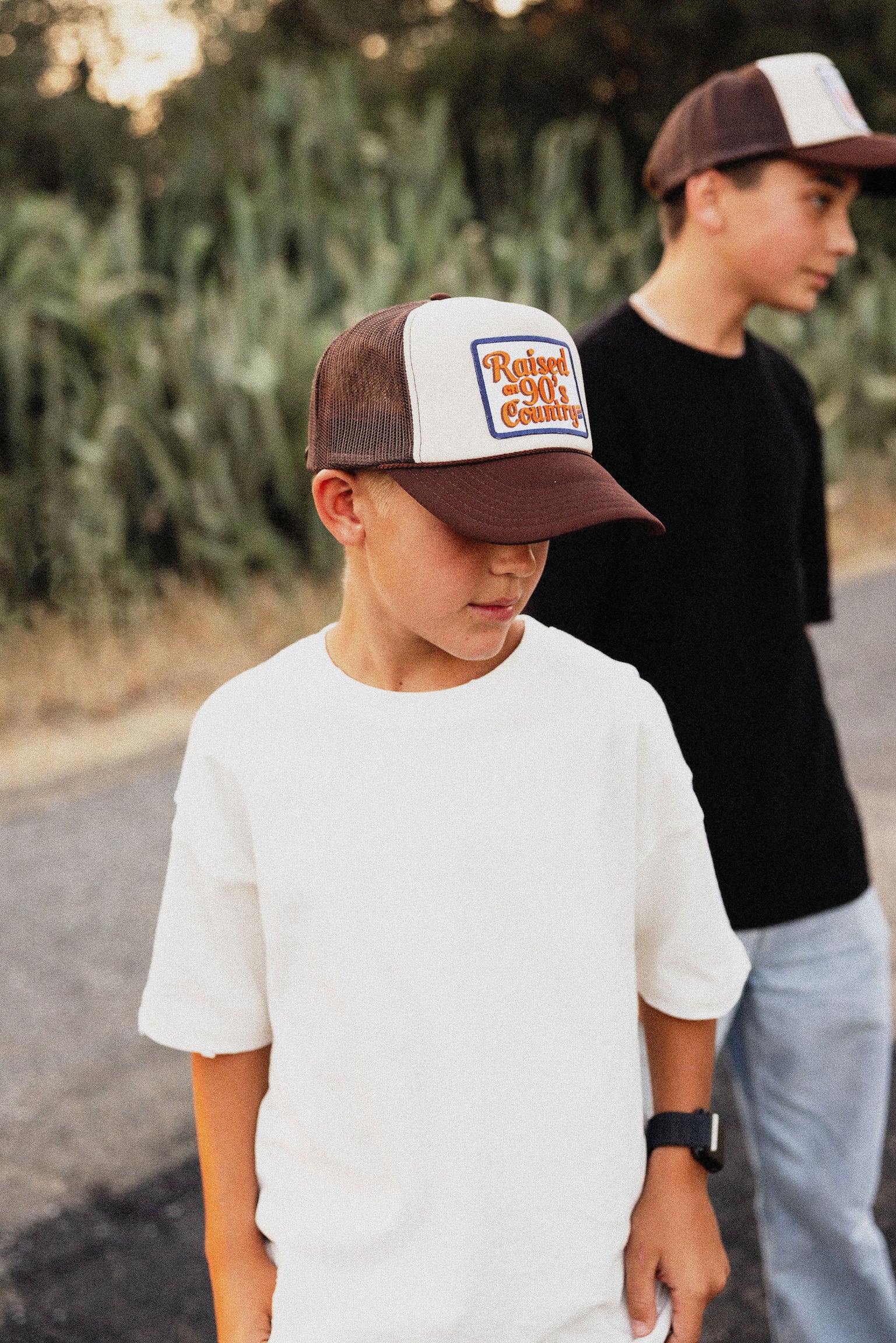 Raised on 90’s Country Trucker Hat